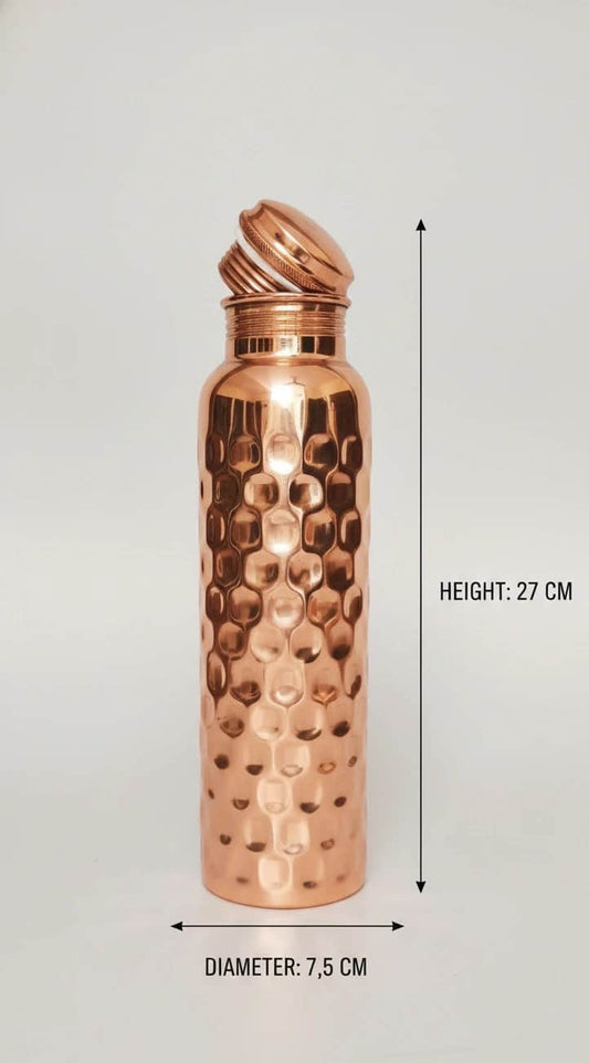 Copper hammered water bottle with measurements on a white background
