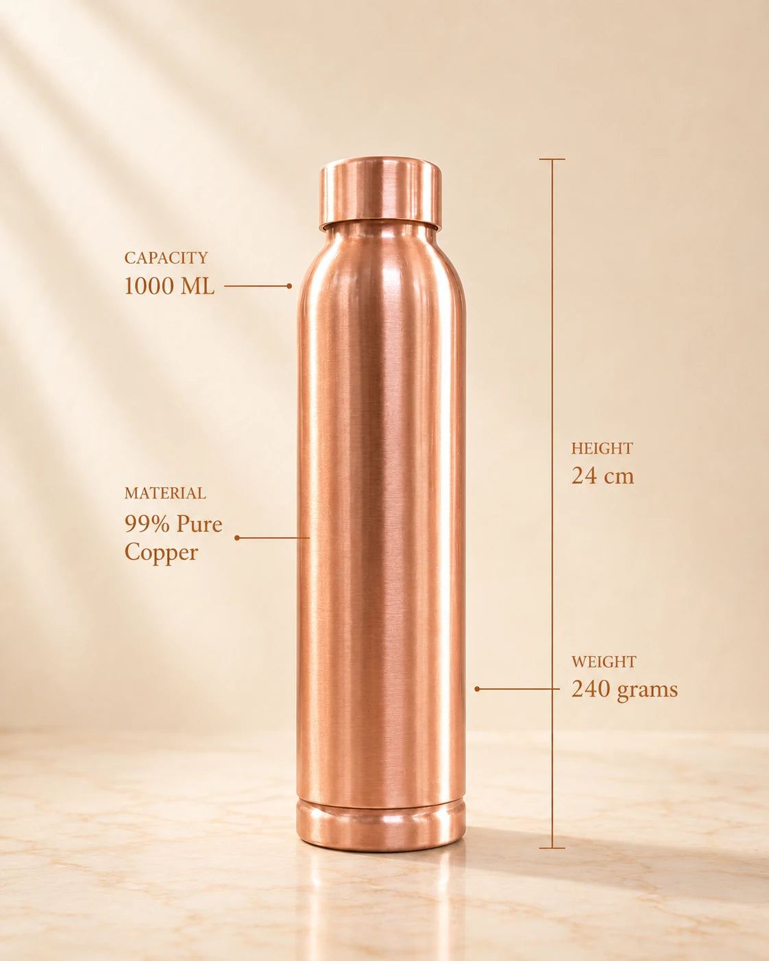 A 1000 mL copper water bottle stands upright on a light beige surface against a warm beige background. Text overlays indicate its material as 99% pure copper, height of 24 cm, and weight of 240 grams.