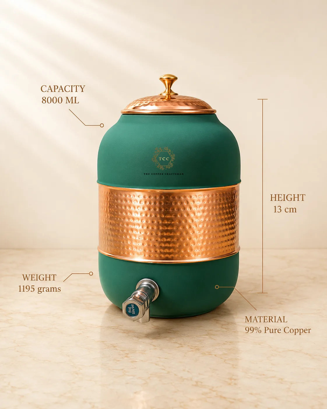 A 99% pure copper water dispenser with a dark green body, a hammered copper middle band, and a copper lid, shown with text overlays detailing its capacity, height, weight, and material.