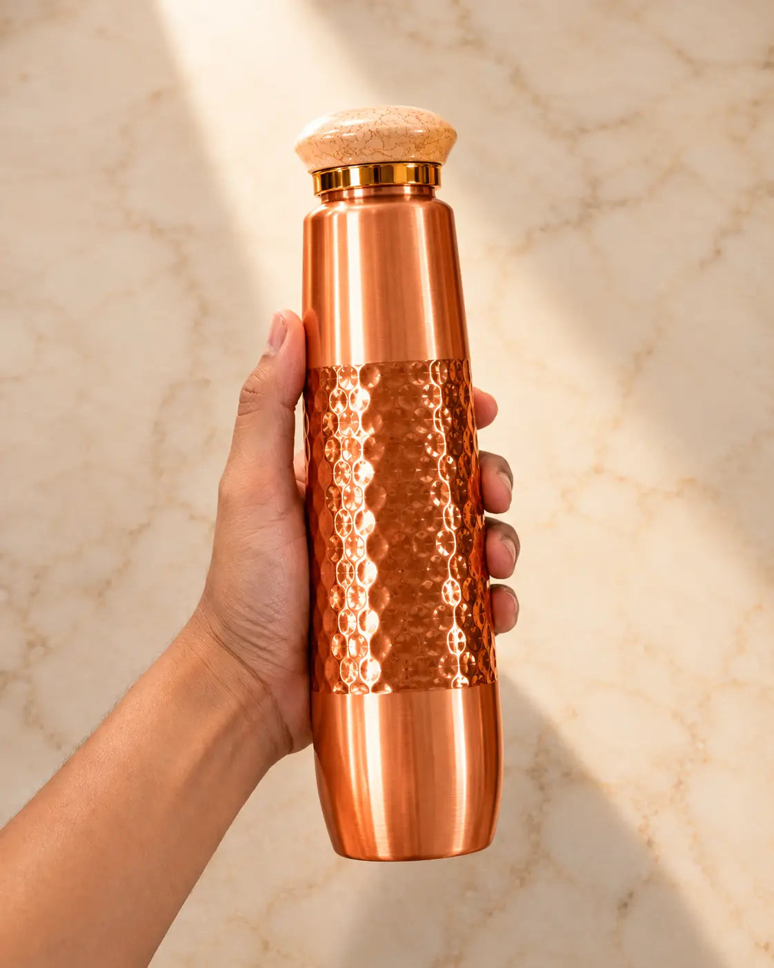 TCC_Signature_Hand-Hammered_Copper_Water_Bottle on hand