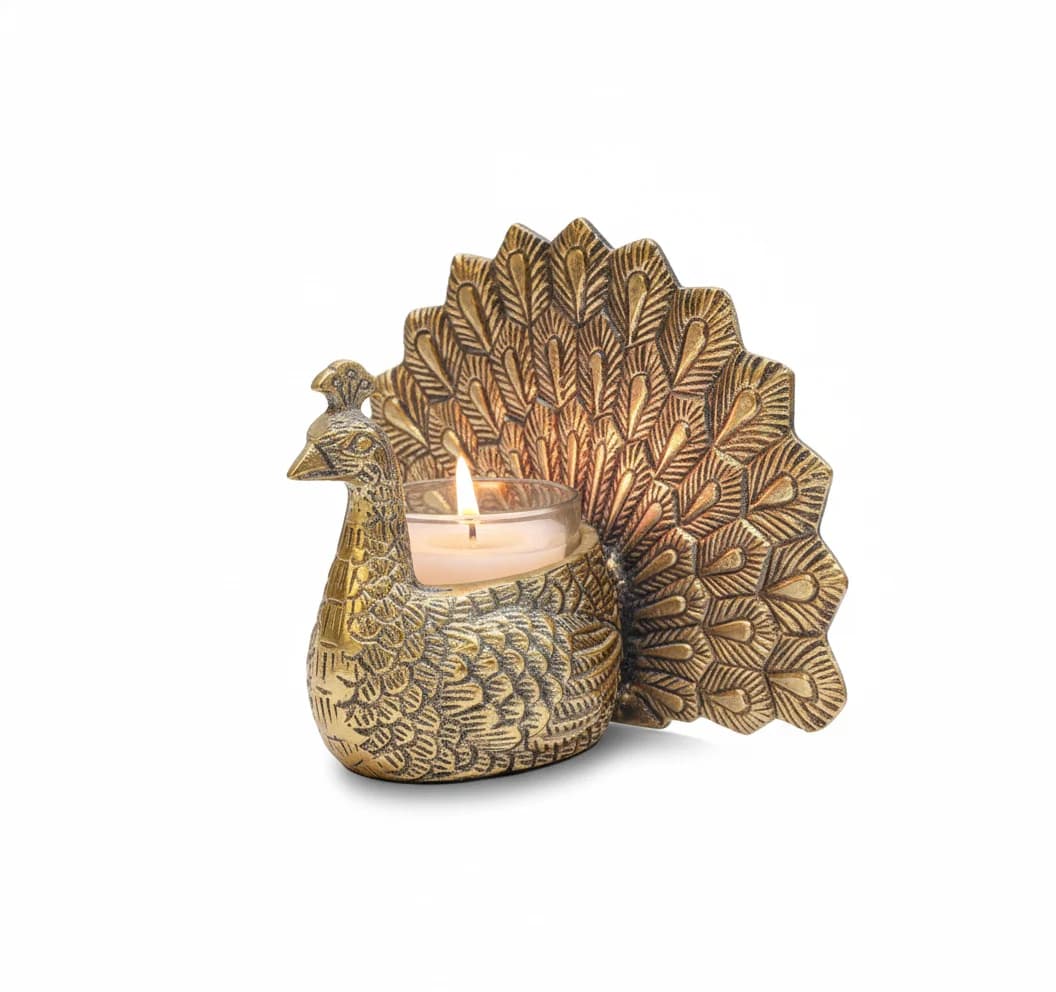 Decorative candle holder shaped like a peacock on a white background