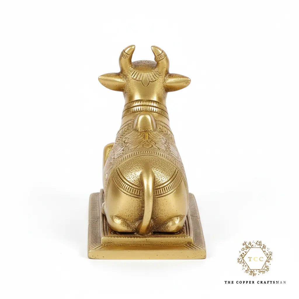 Gold bull statue on a white background with 'The Copper Craftman' logo.
