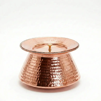 Copper candle holder on a white background