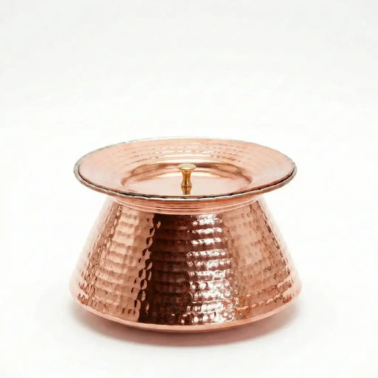 Copper candle holder on a white background