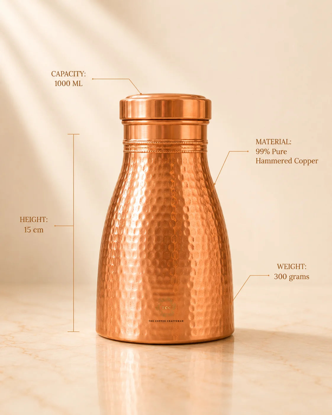 A hammered Copper Bedroom Jar 1L measurement callouts showing capacity 1000 ml, height 15 cm, and weight 300 grams, on a warm beige background.