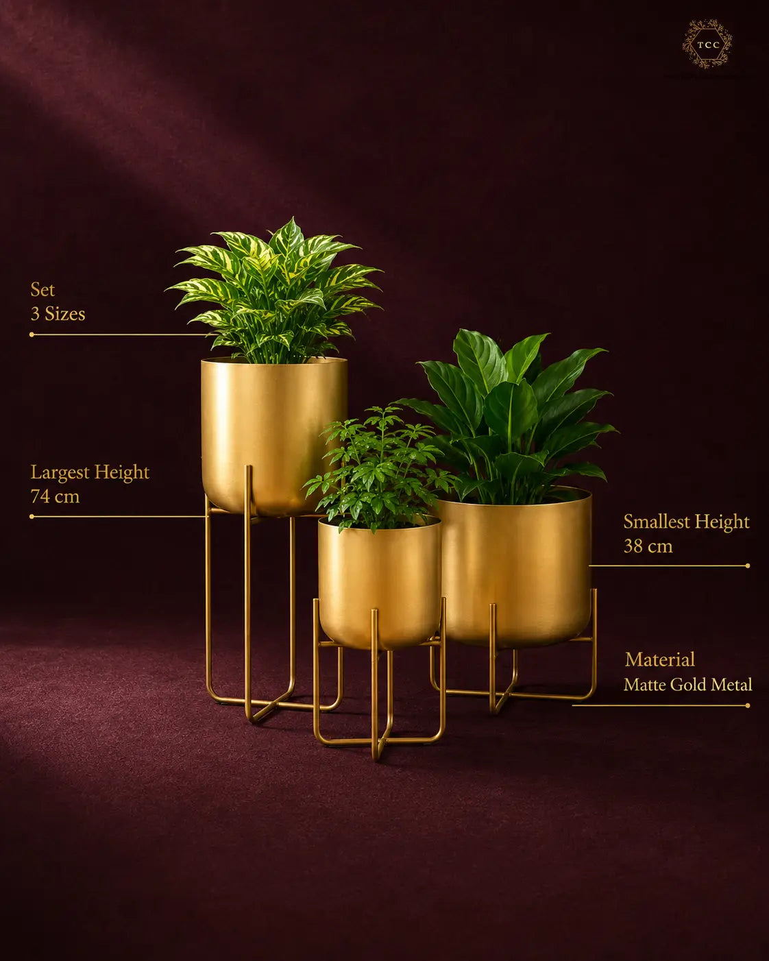 Three gold matte metal planters in different sizes with green leafy plants, displayed on a dark burgundy background with text overlays showing dimensions and material details.